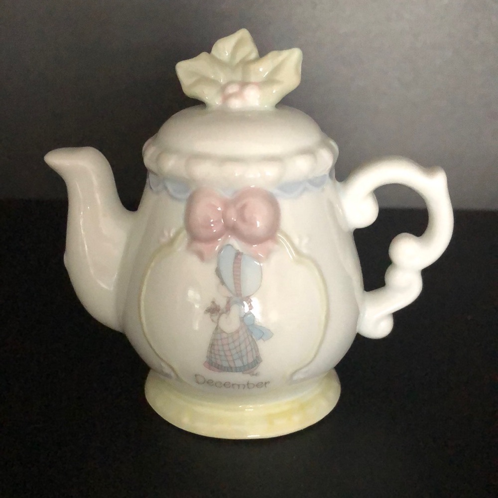 Precious Moments tea cup figurine